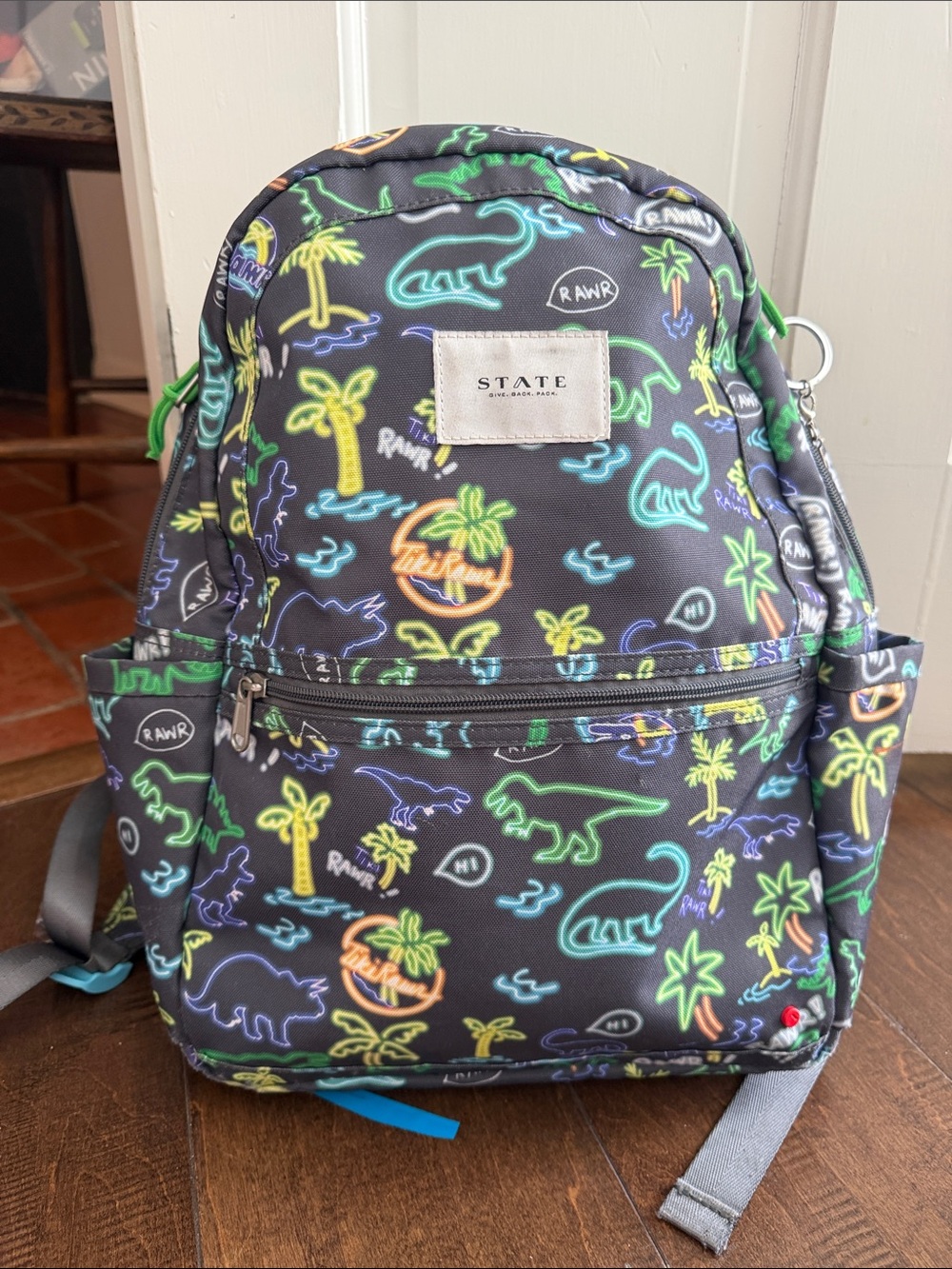 STATE Kids Neon Dino Mini Backpack - Black with Green, Yellow & Blue Accents